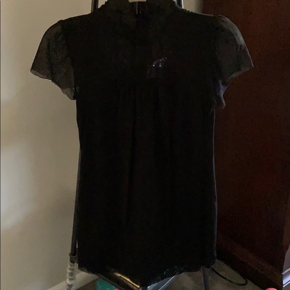 Black short sleeve top. - Picture 2 of 5